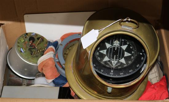 A brass ships binnacle and a quantity of nautical instruments and flags